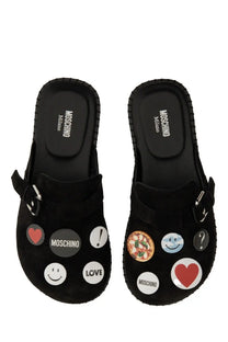 Moschino women’s sandalo pin black slide sandals in black suede with colorful circular patches of hearts smiley faces pizza and logo