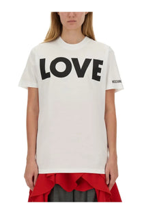 Moschino women’s white cotton t-shirt with bold black love lettering and small brand logo on the sleeve