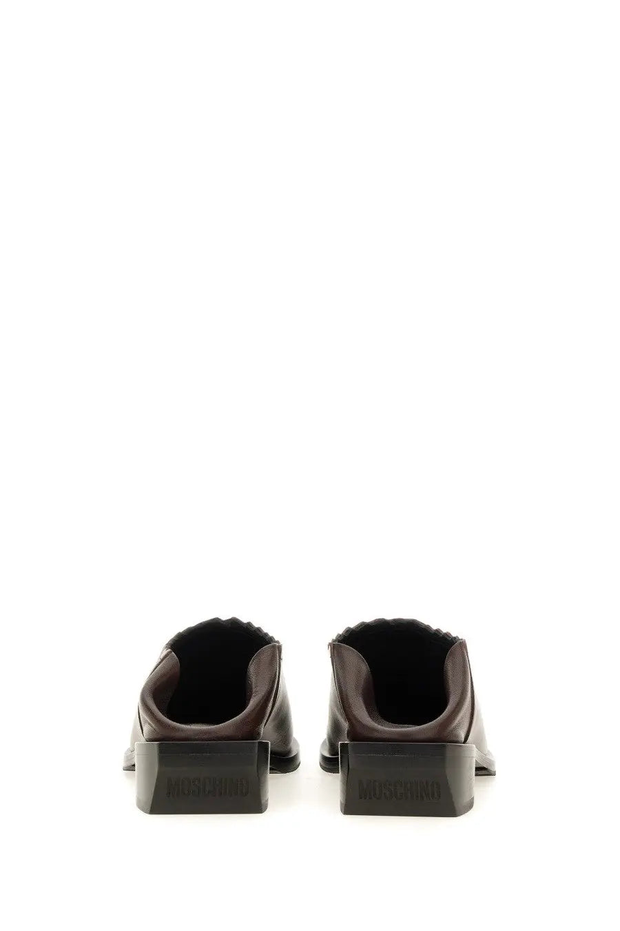 Dark brown leather moschino women’s shootie mules with chunky black cuban heel featuring moschino logo
