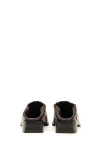 Dark brown leather moschino women’s shootie mules with chunky black cuban heel featuring moschino logo