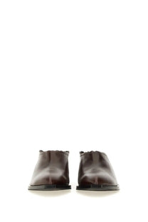 Moschino women’s shootie cuban heel brown dark brown leather mules with scalloped edge and black soles