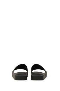 Msgm women’s slide sandal black in black rubber with a minimalist design and thick platform sole