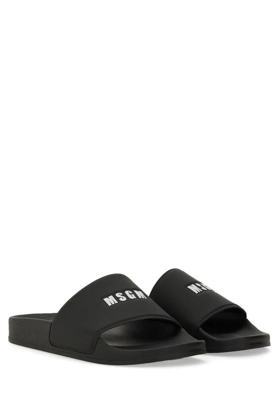 Black msgm women’s slide sandal with white logo branding on the strap for casual wear