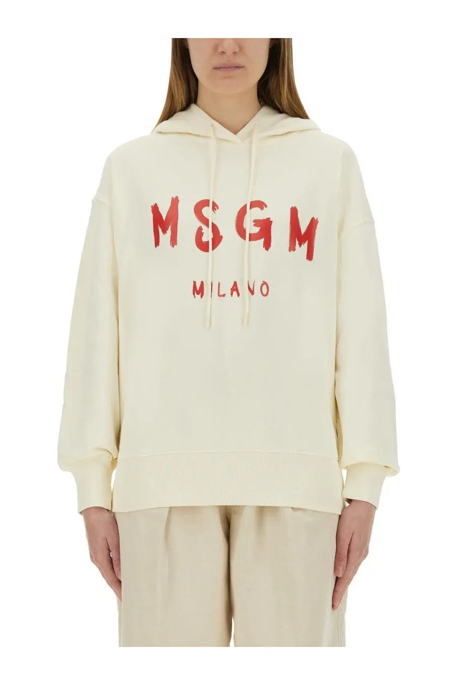 Msgm women’s cream-colored hoodie with bold red msgm milano lettering across the chest in white sweatshirt style