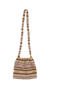 A woven canvas shoulder bag with drawstring closure in earthy beige brown and muted pink stripes from needles mens collection
