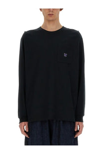 Needles men’s black long-sleeved crewneck tee with small embroidered butterfly logo on left chest pocket