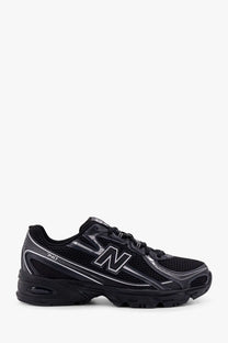 New Balance men’s mesh sneakers in black with silver accents and a breathable mesh upper