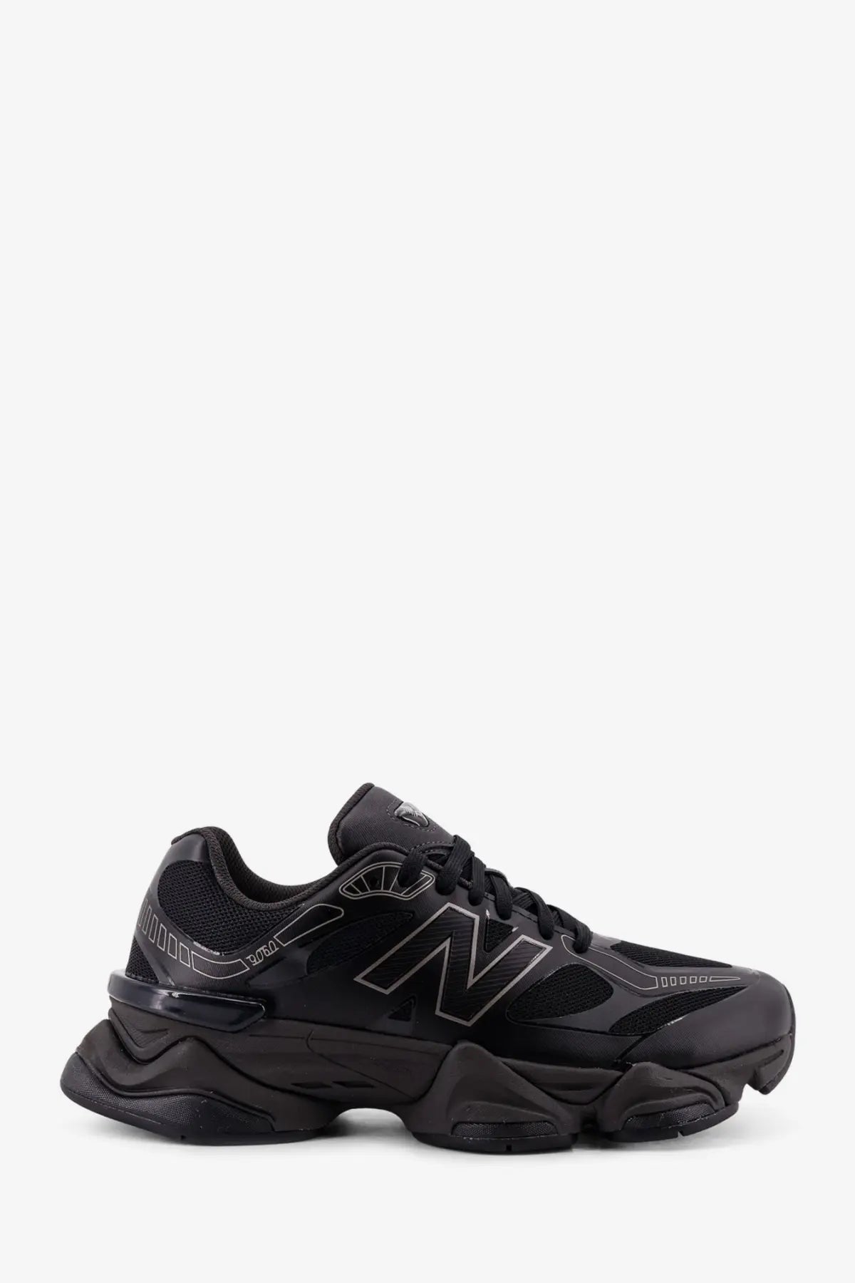 New Balance men’s mesh sneakers black with chunky textured sole and subtle gray logo detailing