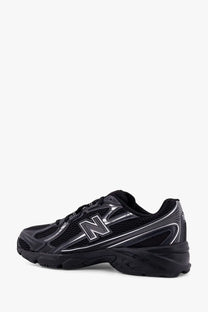 New balance men’s mesh sneakers black with silver mesh and reflective accents for running and training