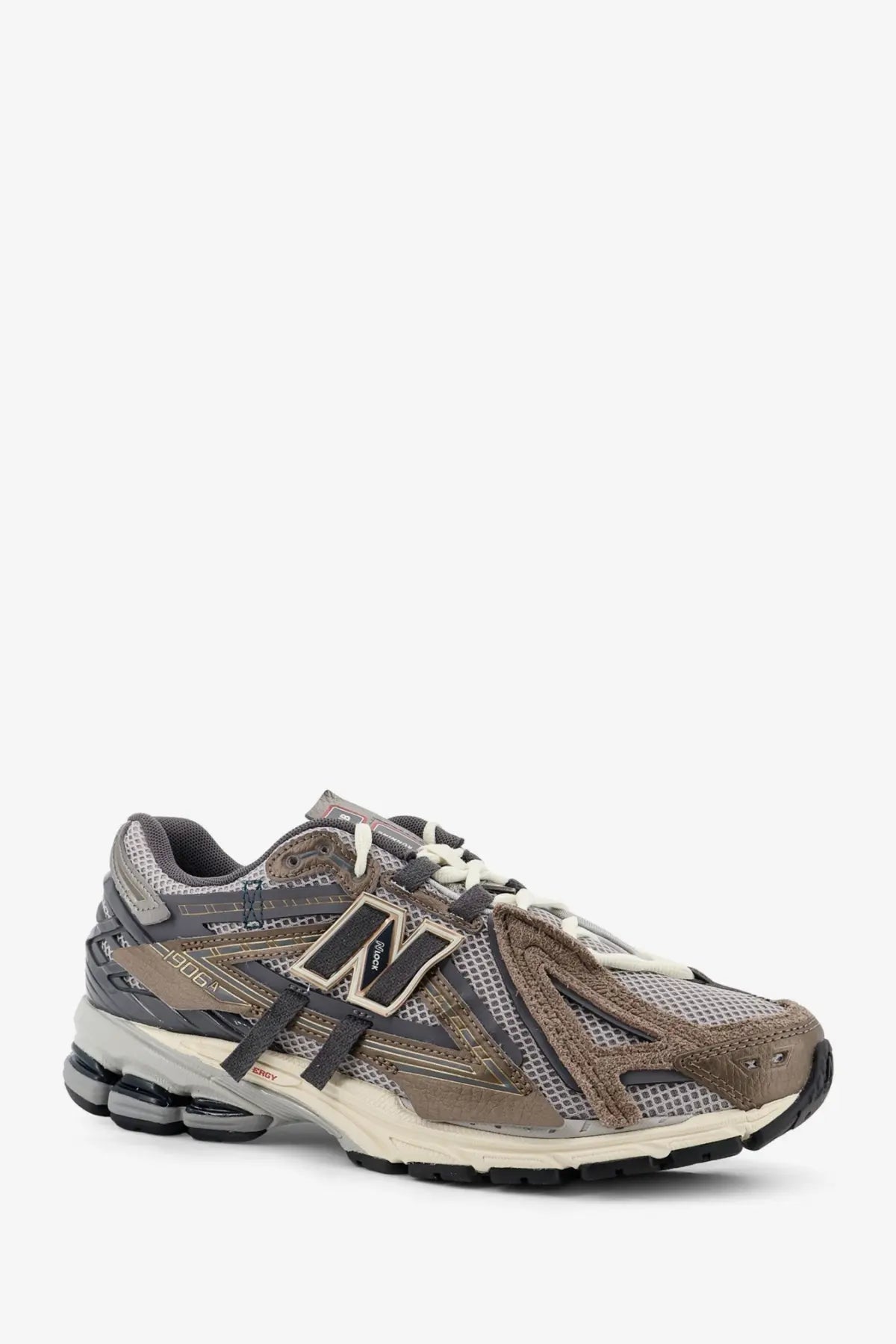 New Balance men’s mesh sneakers brown with gray and beige 506 running shoe featuring mesh suede and synthetic overlays