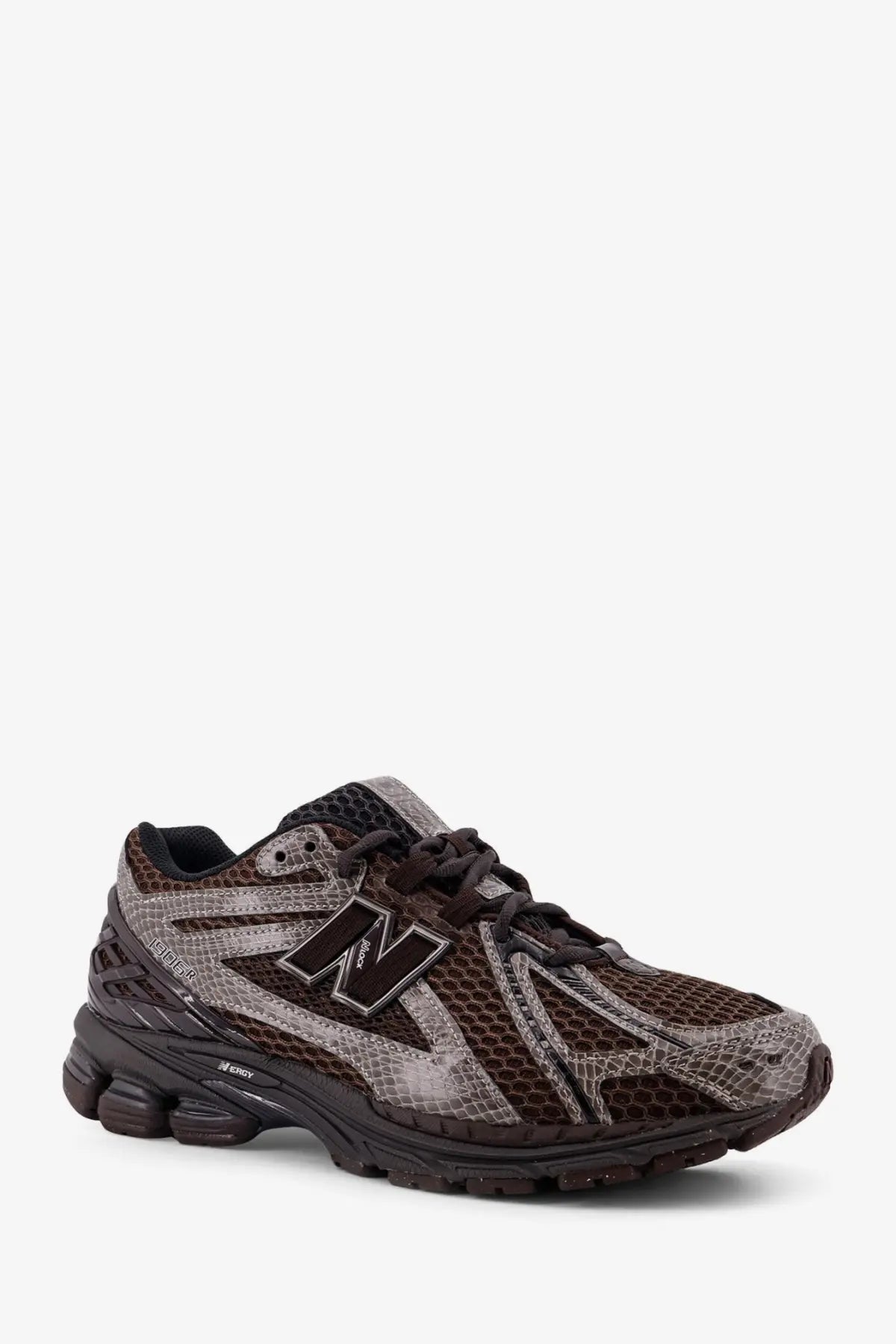 New Balance men’s mesh sneakers grey featuring brown and gray snakeskin pattern with black laces and rubber sole