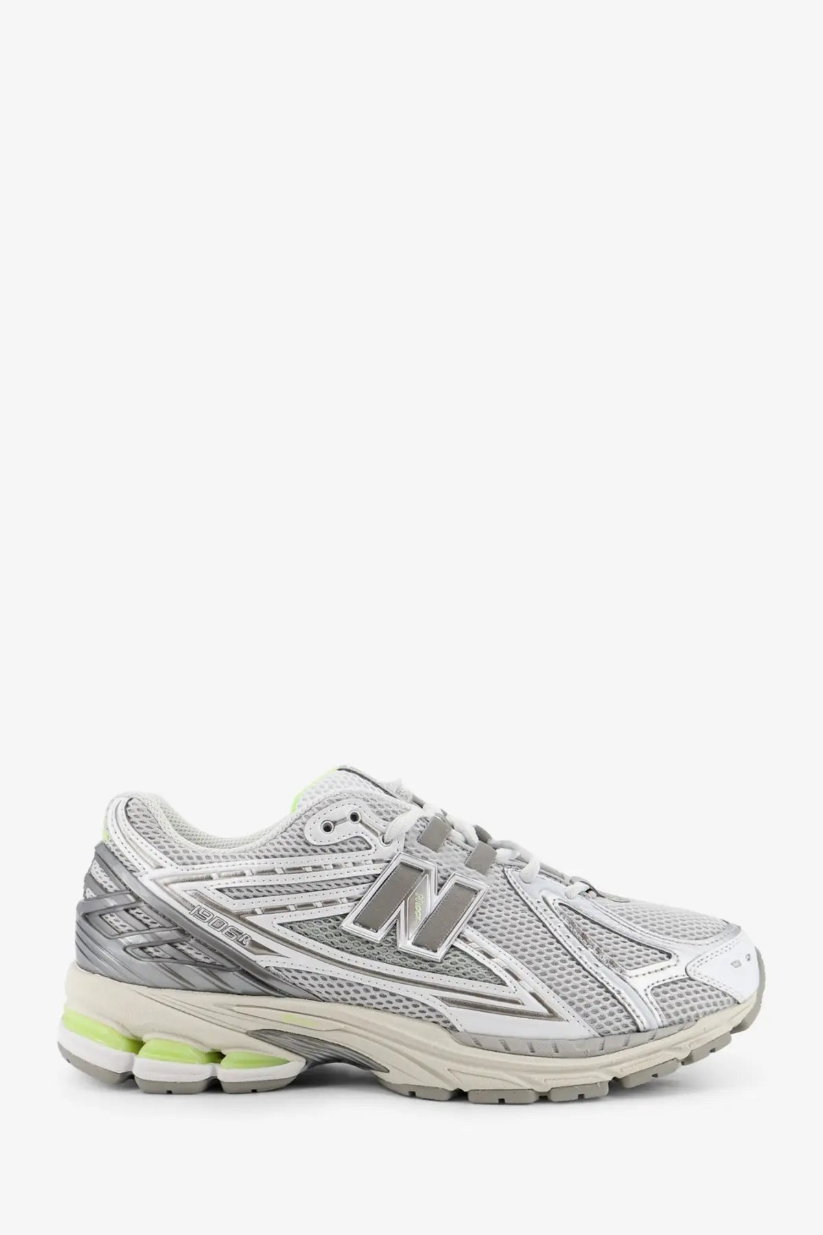 New Balance men’s mesh sneakers grey with silver and white upper, gray branding, and lime green midsole