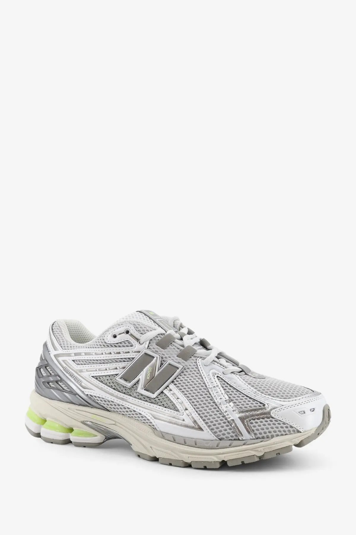 New Balance men’s mesh sneakers grey with silver and white mesh upper, gray accents, and lime green midsole