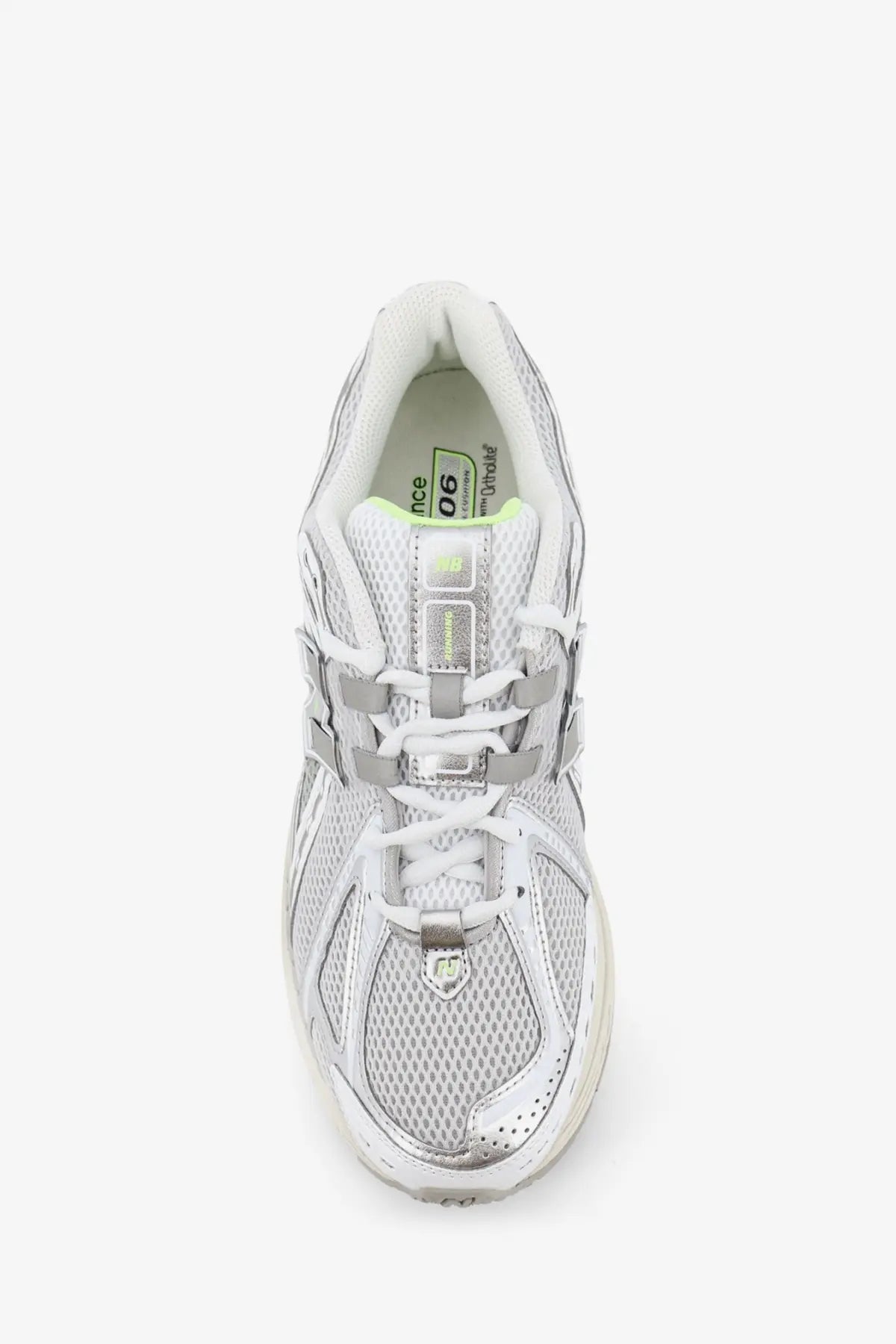 New Balance men’s mesh sneakers grey in white and silver with metallic accents and lime green interior lining