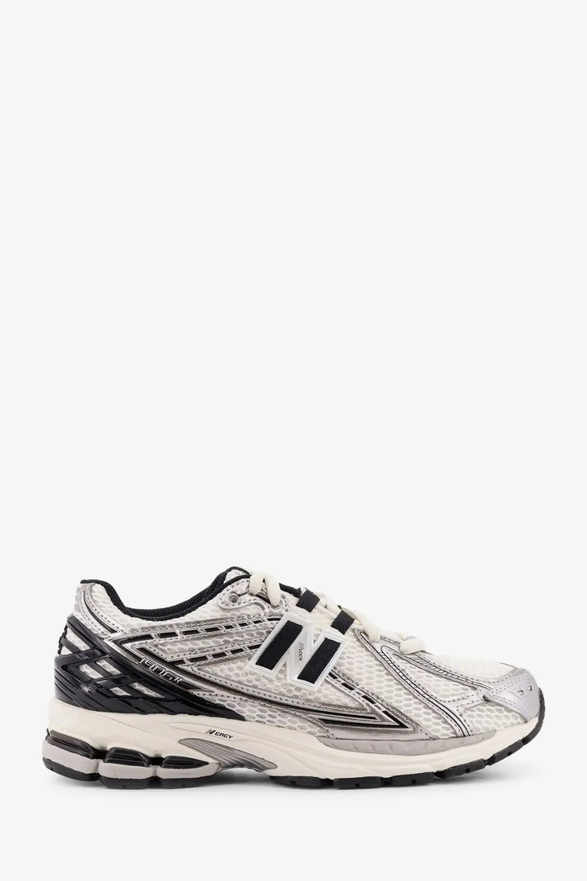 New Balance men’s mesh sneakers white in black and white with mesh upper rubber outsole and signature n logo