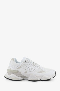 New balance men’s white mesh sneakers with chunky layered sole and breathable mesh upper for casual wear