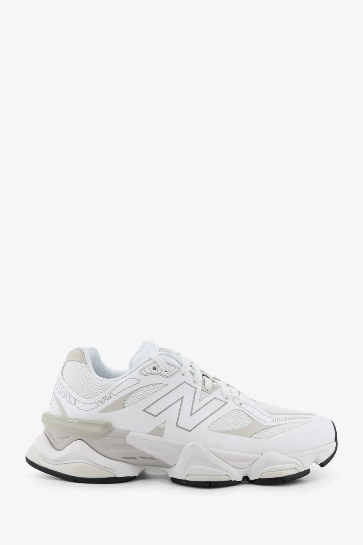 White new balance men’s mesh sneaker with chunky layered sole and breathable mesh upper for casual wear