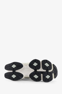 New balance men’s grey mesh and suede sneakers with white and black chunky sole featuring diamond-shaped grips