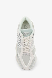 New Balance men’s mesh and suede sneakers in grey with white and light gray mesh and synthetic overlays