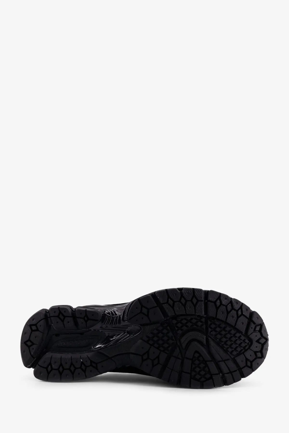 Black rubber sole with textured geometric tread on new balance men’s mesh and technical fabric loafers black
