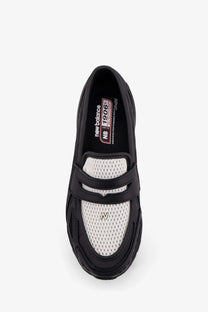 New Balance men’s black and white nb 1906 sneaker with mesh upper and rubber sole combining style and comfort