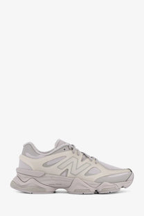 New Balance men’s beige nylon sneaker with chunky layered sole and breathable mesh upper in grey tones