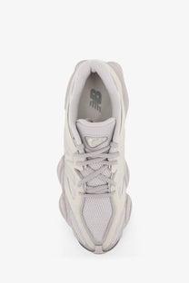 New Balance men’s nylon sneaker in grey with a light gray mesh upper and chunky layered sole