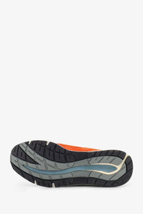 New balance men’s suede sneakers in orange and black with gray midsole and blue accent stripe for casual wear