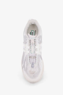New balance men’s technical fabric sneaker in white with textured semi-transparent upper and matching laces