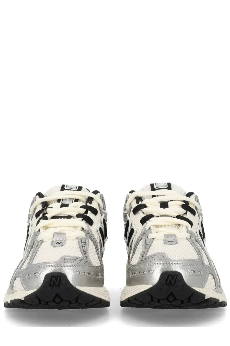New balance unisex sneaker 1906r silver featuring silver and white 990v3 design with black accents