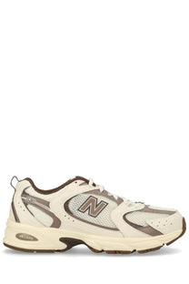 New Balance unisex sneaker beige in cream and brown with mesh and synthetic overlays for casual wear