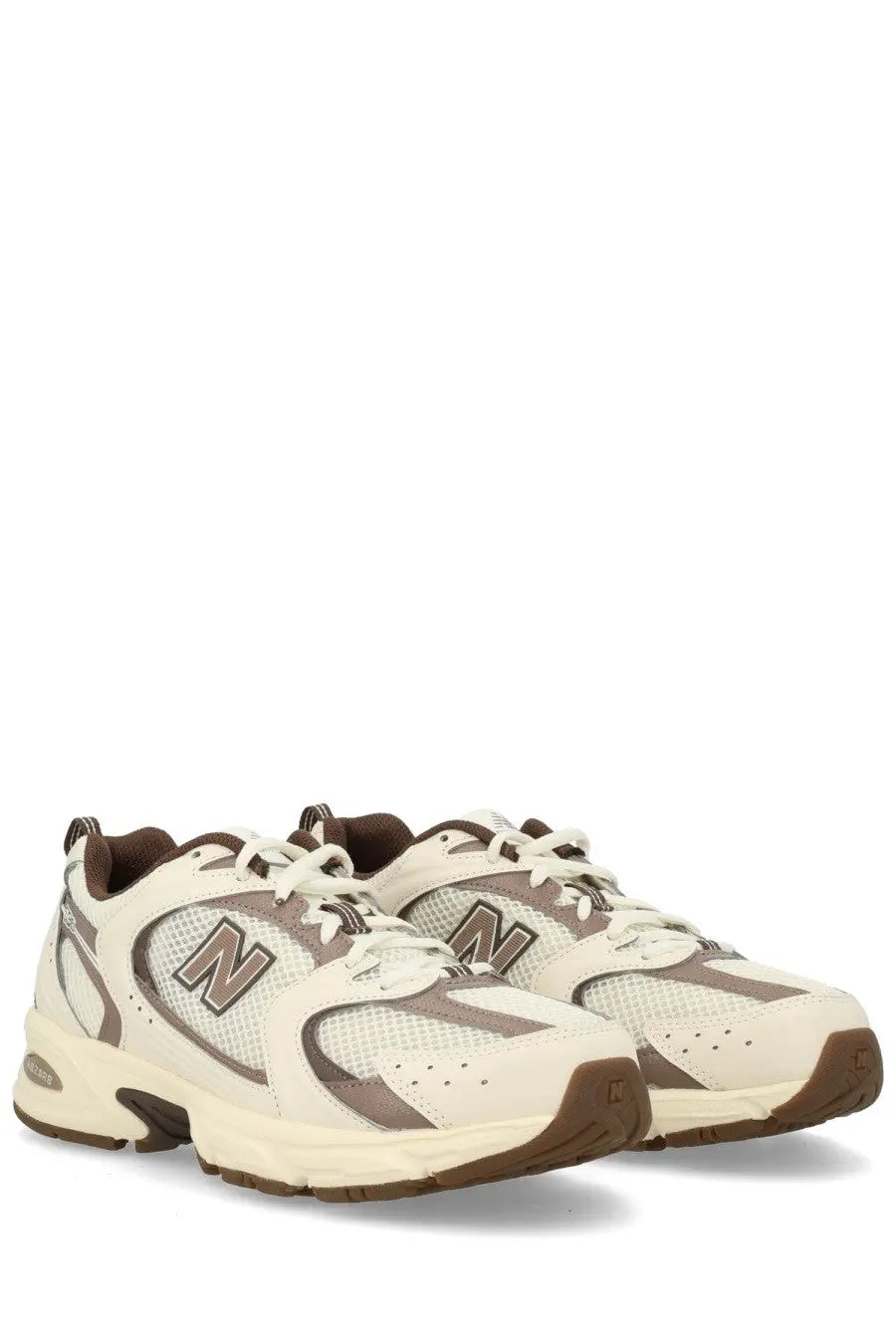 New Balance unisex sneaker beige with cream and brown mesh and synthetic overlays for comfortable wear