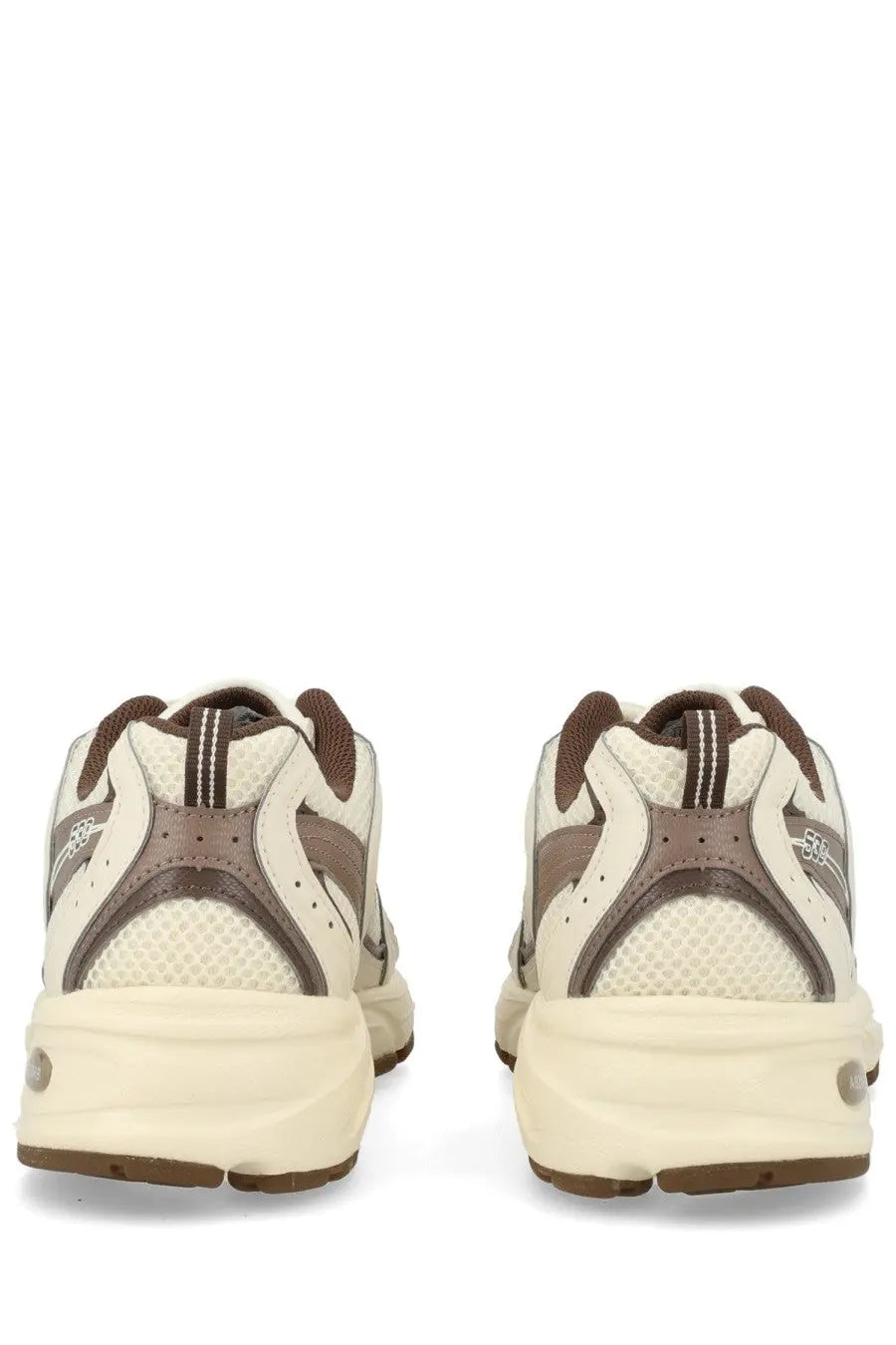 New Balance unisex sneaker beige cream and brown athletic shoe with mesh and synthetic overlays and chunky midsole