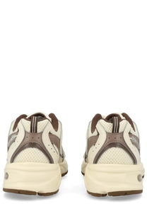 New Balance unisex sneaker beige with cream and brown mesh and synthetic overlays and chunky midsole