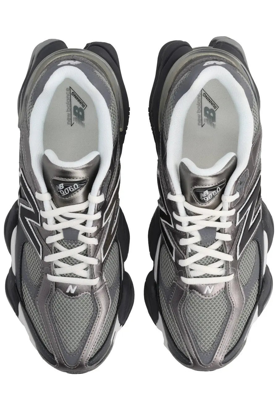 New balance 9060 sneaker with sleek metallic gray and black upper mesh panels white laces and bold rubber soles