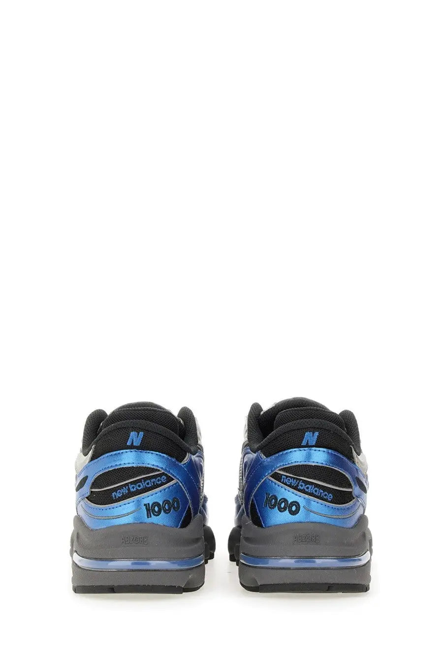 New Balance unisex sneaker blue in blue and black with metallic accents featuring durable materials for everyday wear