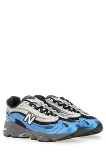New Balance unisex sneaker blue featuring blue and silver colors with black accents in a sporty design
