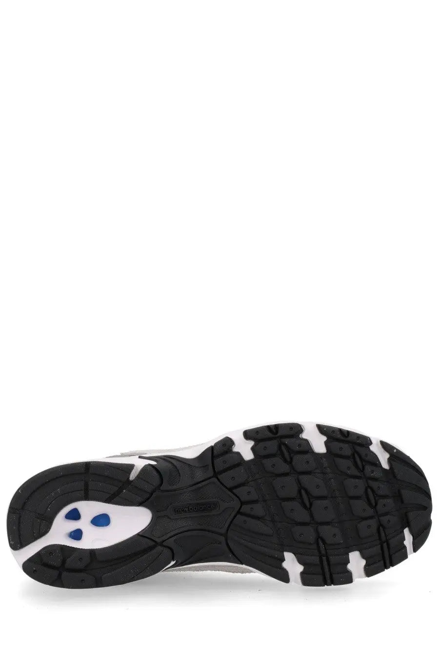New Balance unisex sneaker grey featuring a black and white athletic shoe with blue midsole accents front view