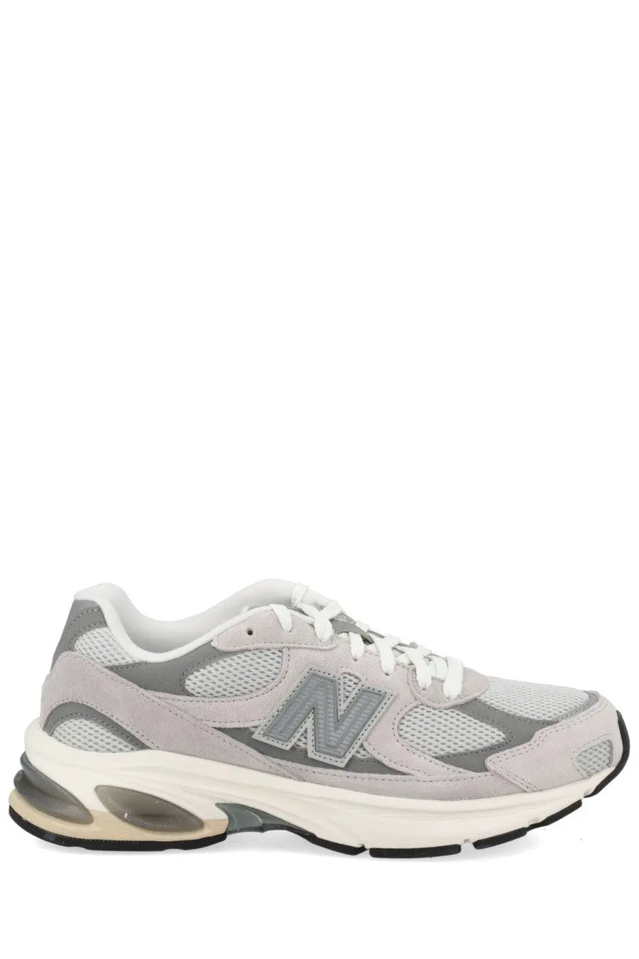 New balance unisex sneaker grey with mesh and suede upper white laces and translucent air cushioned sole