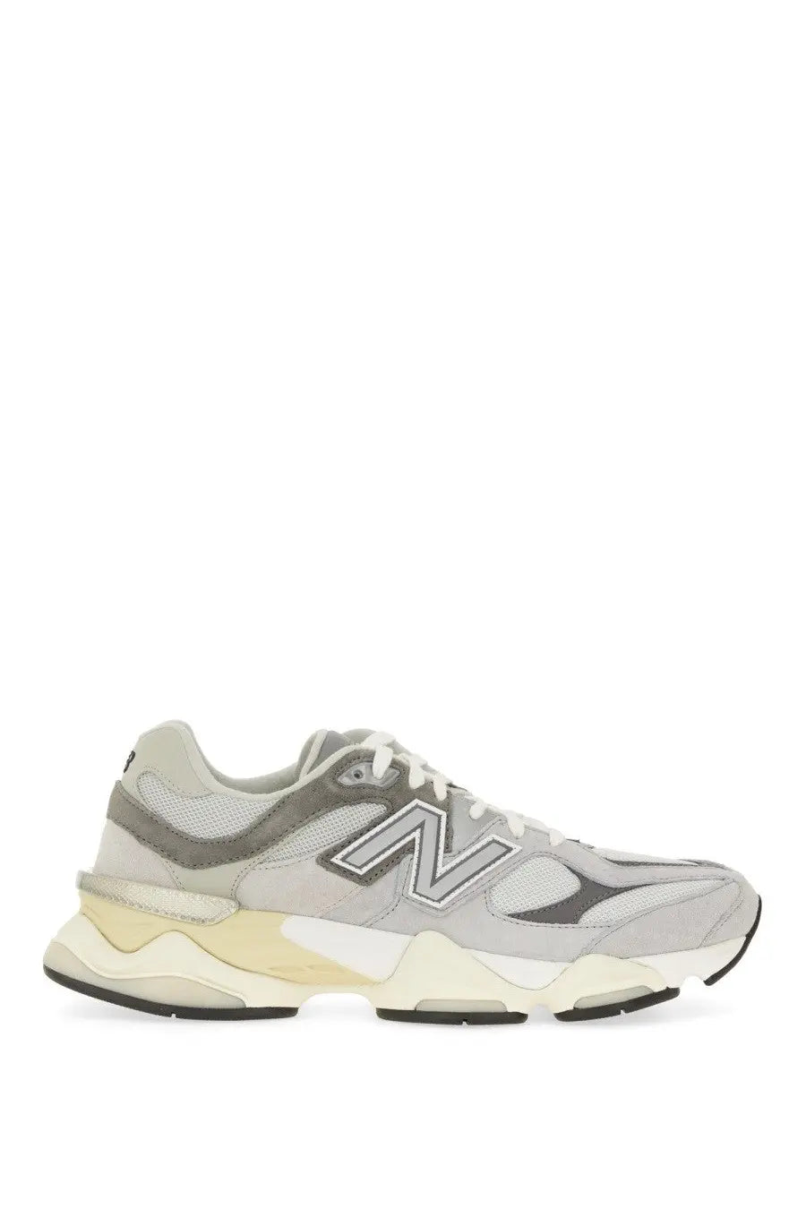 New balance unisex sneaker grey with a chunky layered sole featuring gray and cream color accents