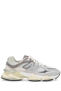 New Balance unisex sneaker grey featuring gray and cream colors with a chunky layered sole design