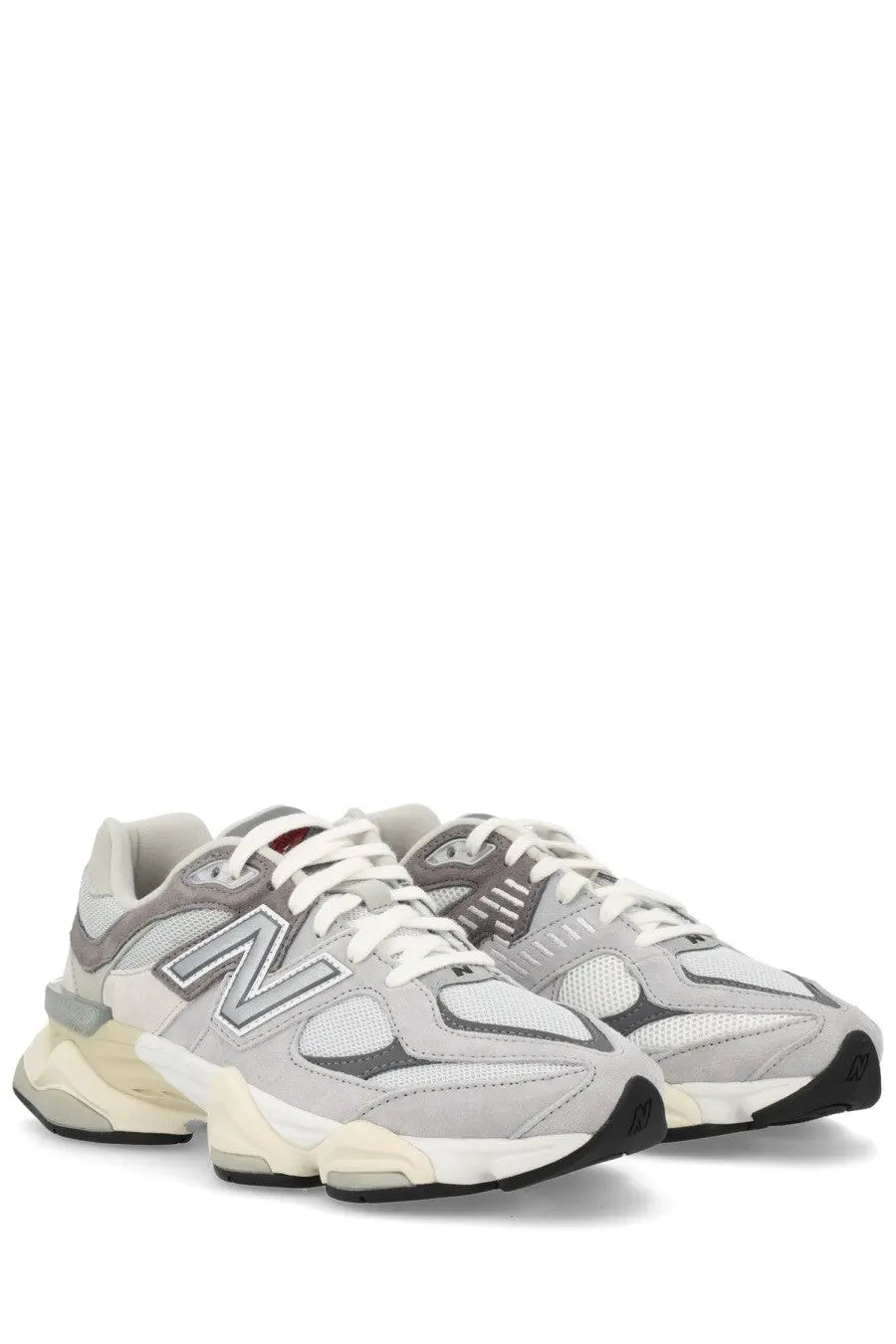 New Balance unisex sneaker grey with chunky retro-inspired design in gray and white mesh and suede materials