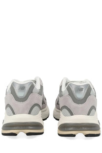 New balance unisex sneaker grey featuring gray and white suede mesh and rubber details in 990v3 design