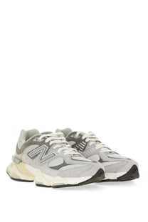 New Balance unisex sneaker grey with gray and white upper and chunky layered sole design for casual wear
