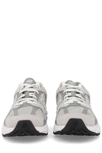 New Balance unisex sneaker grey with gray and white mesh upper, rubber outsole, and black heel branding