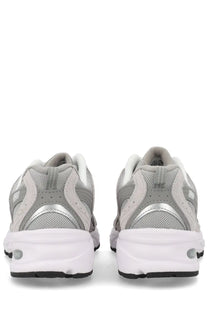 New Balance unisex sneaker grey with gray and white mesh and synthetic overlays and silver metallic heel accent
