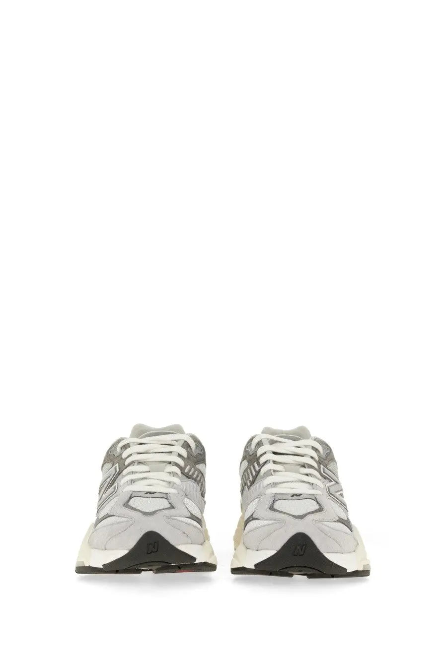 New Balance unisex sneaker grey with gray and white chunky retro design and black rubber soles