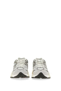 New Balance unisex sneaker grey with gray and white chunky retro design and black rubber soles