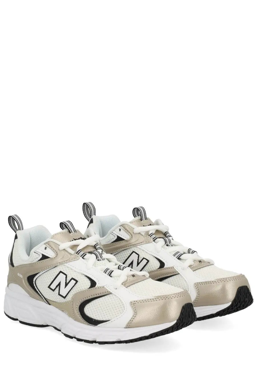 New Balance unisex sneaker multicolor featuring white and metallic gold leather with black accents in the 520 model