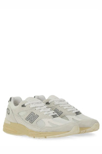 Cream-colored new balance unisex sneaker u991 white with suede and mesh upper gray logo accents and beige rubber sole